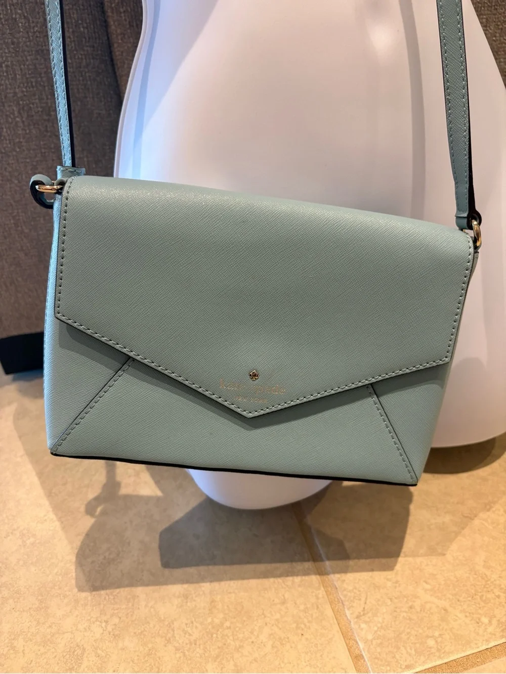 Kate Spade NY Cedar Street Monday envelope style leather crossbody bag blue